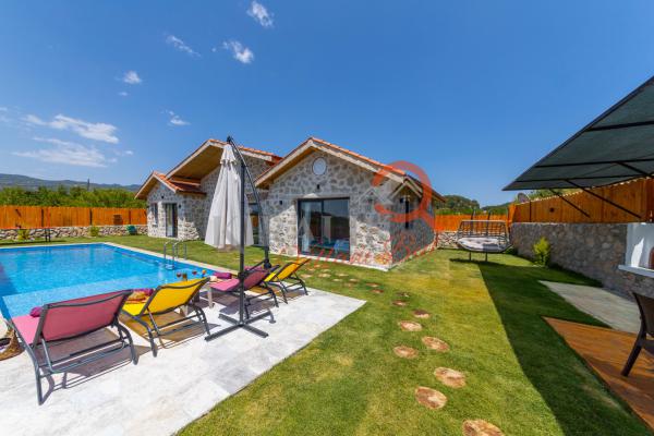 Kalkan Sarıbelen Bölgesinde Otantik Tasarıma Sahip Tatil Villası